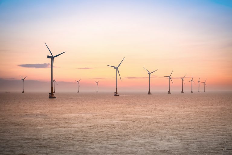 offshore wind farm in sunset