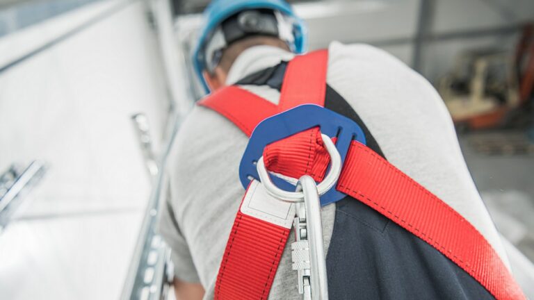 Personal Fall Arrest Systems. Safety Harness Working on Height. Scaffold Job.