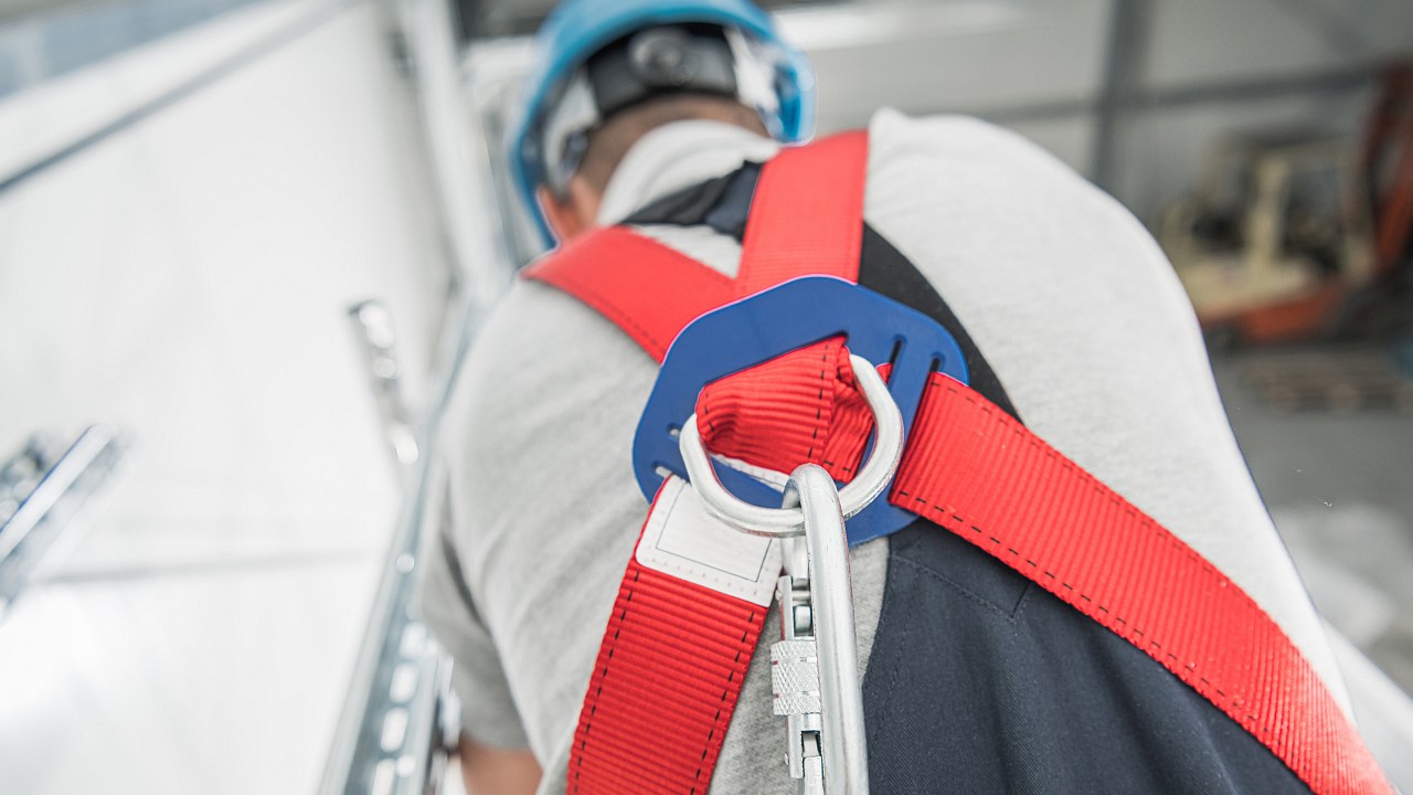 Personal Fall Arrest Systems. Safety Harness Working on Height. Scaffold Job.